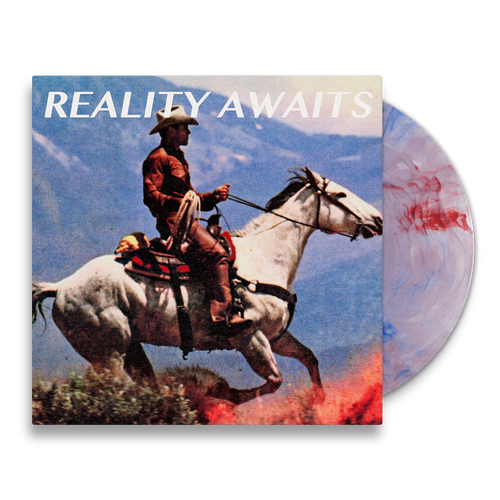 The Strokes Reality Awaits Vinyl record with a cowboy on a horse in front of a mountainous background. The Marble Colored Vinyl is poking out of the packaging to showcase the color variant. 